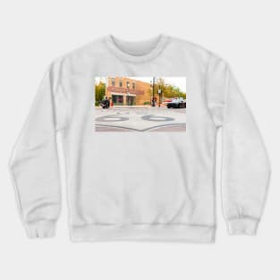 Route 66 sign on road in Winslow Arizona Crewneck Sweatshirt